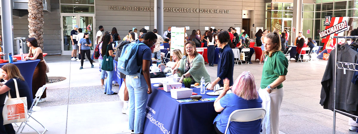 Student at resource table during the 2024 College Mixer