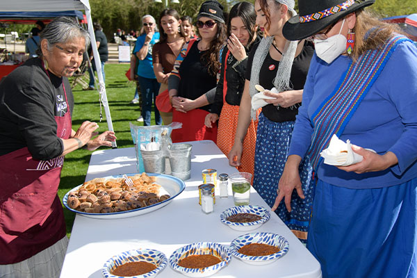 Thomasa Rivas serves traditional O'odham food