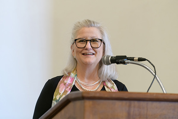 JoAnna Westcott speaking at luncheon