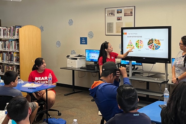 YES Camp students watching presentation on Nutrition