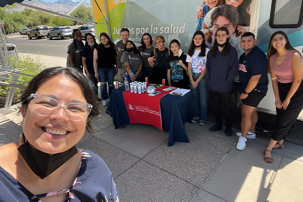  2022 Young Global Leaders group helping with the COPH Mobile Health Unit