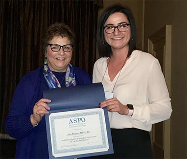 Ana Florea (right) and Electra Paskett, Professor of Epidemiology at Ohio State University.