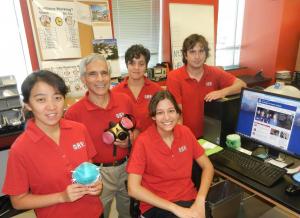 Phil in a lab with students