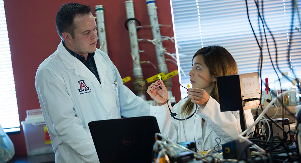 College of public health students studying Environmental Health Science in a lab