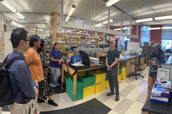 IMU Malaysia group visits a public health lab with Dr. Frank von Hippel