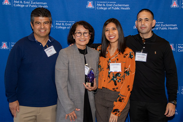 Dr. Rosales with Tomas Nuño PhD ‘11, MA, Sheila Soto DrPH '23,
        MPH '17, and Refugio Sepulveda DrPH '17, MPH '12, MPA